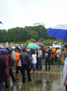 The heavy downpour that came with the dark clouds did not deter the crowd from giving Kugan a dignified send off.